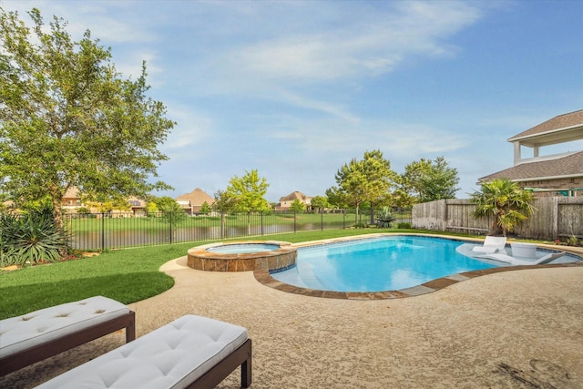 view of pool featuring a patio, a pool with connected hot tub, and a water view