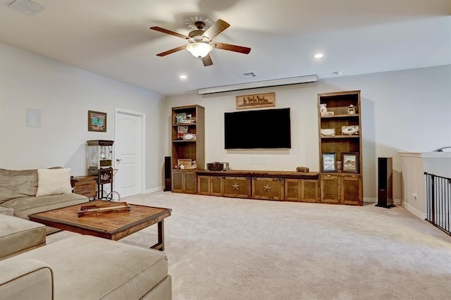 living room featuring ceiling fan, light colored carpet, recessed lighting, and baseboards