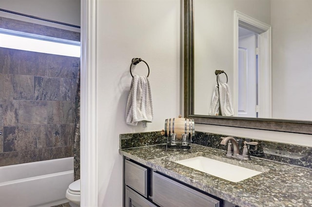 full bathroom featuring vanity, toilet, and shower / bath combination