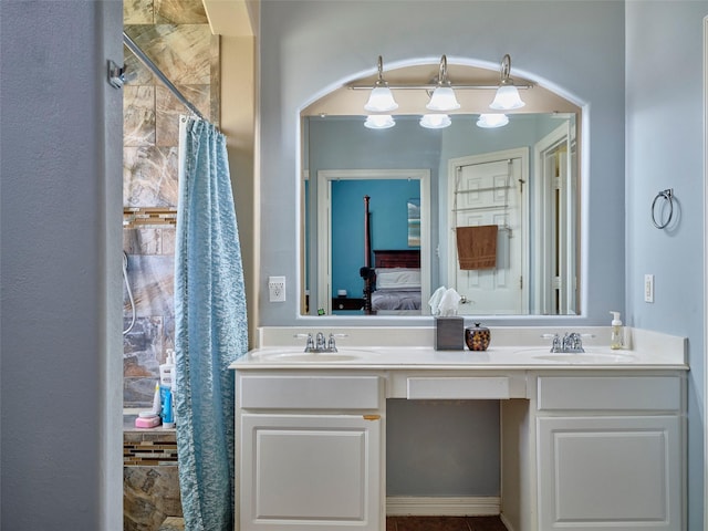23623 Breckenridge Forest Dr, Spring, TX 77373 - ensuite bathroom with a sink, double vanity, and ensuite bathroom
