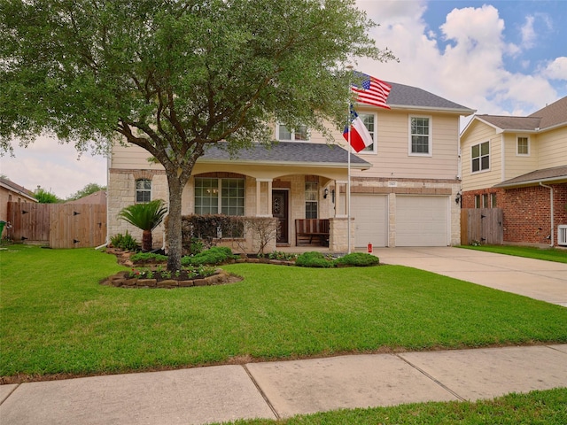 23623 Breckenridge Forest Dr, Spring, TX 77373 - traditional-style home featuring driveway, fence, covered porch, an attached garage, and stone siding