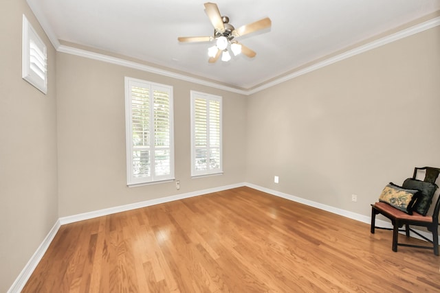 3818 Rose Grove Ln, Katy, TX 77494 - unfurnished room with healthy amount of natural light, light wood-style flooring, a ceiling fan, baseboards, and crown molding