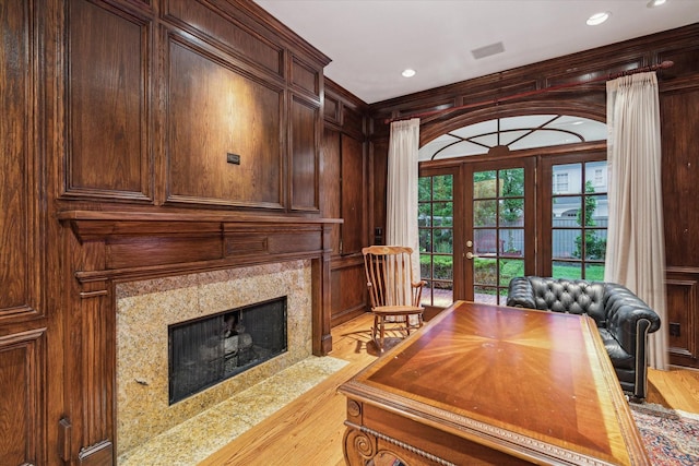 8722 Stable Crest Blvd, Houston, TX 77024 - office space featuring light wood-type flooring, french doors, a premium fireplace, and recessed lighting