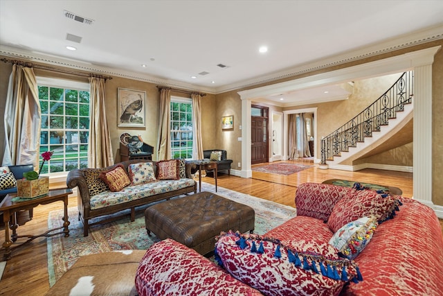 8722 Stable Crest Blvd, Houston, TX 77024 - living area featuring crown molding, wood finished floors, stairway, baseboards, and recessed lighting
