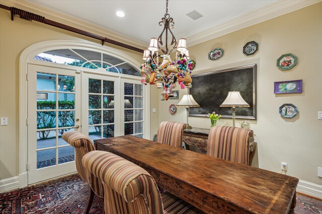 8722 Stable Crest Blvd, Houston, TX 77024 - dining area with a chandelier, ornamental molding, french doors, and baseboards