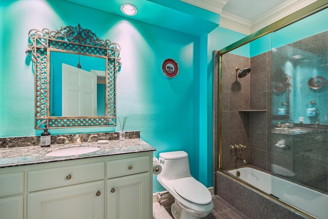 8722 Stable Crest Blvd, Houston, TX 77024 - full bath featuring toilet, crown molding, vanity, bath / shower combo with glass door, and tile patterned flooring