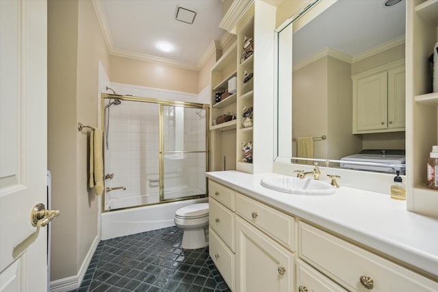 8722 Stable Crest Blvd, Houston, TX 77024 - full bath featuring washer / dryer, toilet, ornamental molding, tile patterned floors, and combined bath / shower with glass door