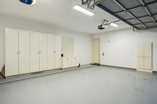 8722 Stable Crest Blvd, Houston, TX 77024 - garage featuring a garage door opener