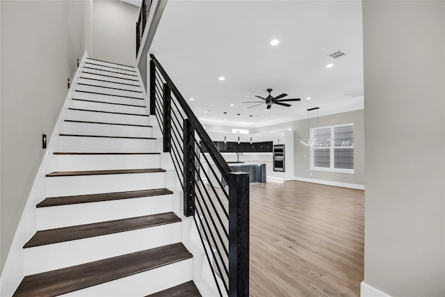 604 W 28th St Unit A, Houston, TX 77008 - stairs with visible vents, wood finished floors, ceiling fan, and recessed lighting