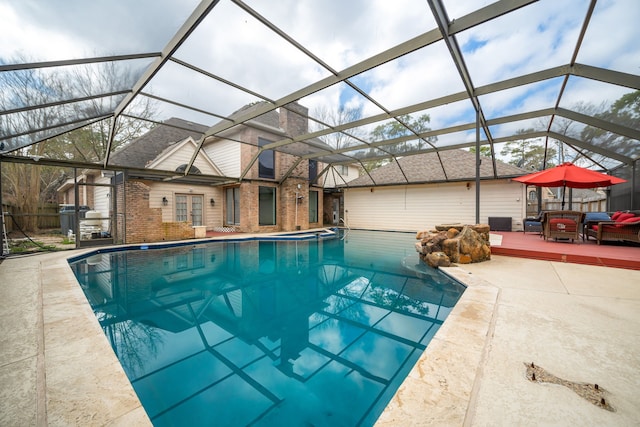 12414 Laneview Dr, Houston, TX 77070 - view of swimming pool with a patio, a pool with connected hot tub, a deck, and glass enclosure