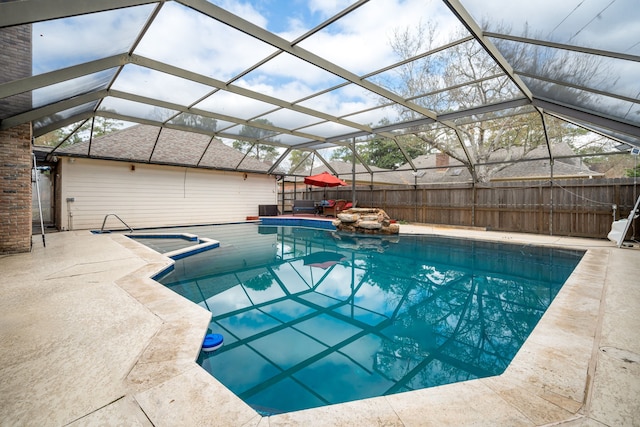 12414 Laneview Dr, Houston, TX 77070 - view of pool featuring glass enclosure, a patio, a fenced in pool, and a fenced backyard