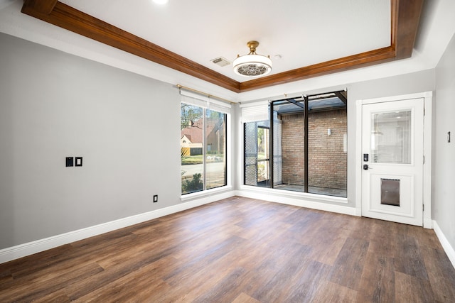 12414 Laneview Dr, Houston, TX 77070 - unfurnished room featuring baseboards, visible vents, crown molding, wood finished floors, and a raised ceiling