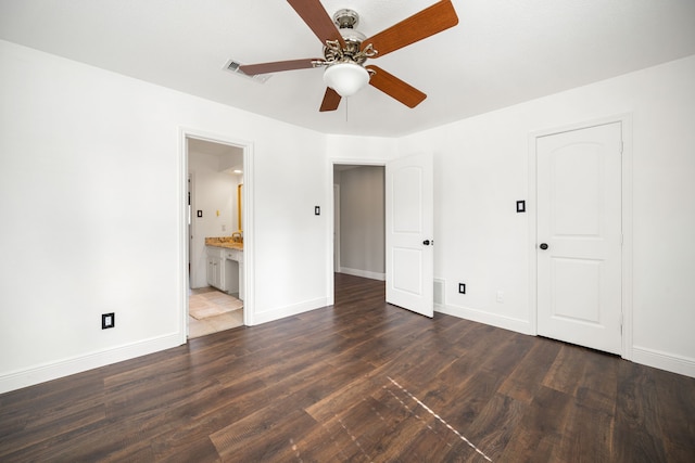 12414 Laneview Dr, Houston, TX 77070 - unfurnished bedroom featuring baseboards, dark wood-style flooring, ensuite bath, and visible vents