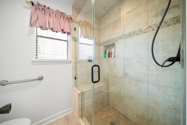 12414 Laneview Dr, Houston, TX 77070 - bathroom with toilet, baseboards, and a shower stall