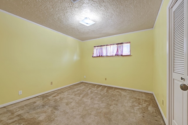 unfurnished bedroom featuring a textured ceiling, carpet floors, crown molding, baseboards, and a closet