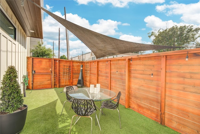 view of patio with fence