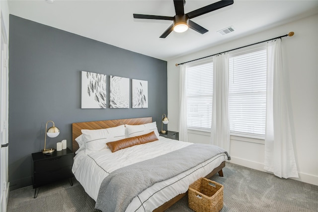 bedroom featuring carpet, baseboards, and a ceiling fan