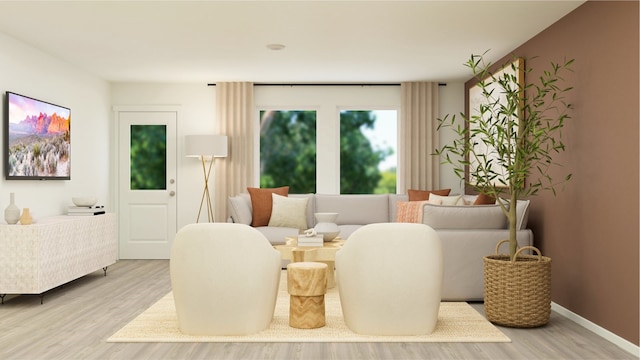interior space featuring baseboards and wood finished floors