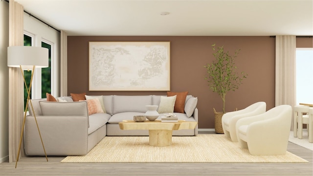 living room featuring baseboards and wood finished floors