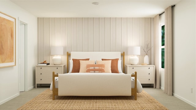 bedroom with carpet floors and baseboards