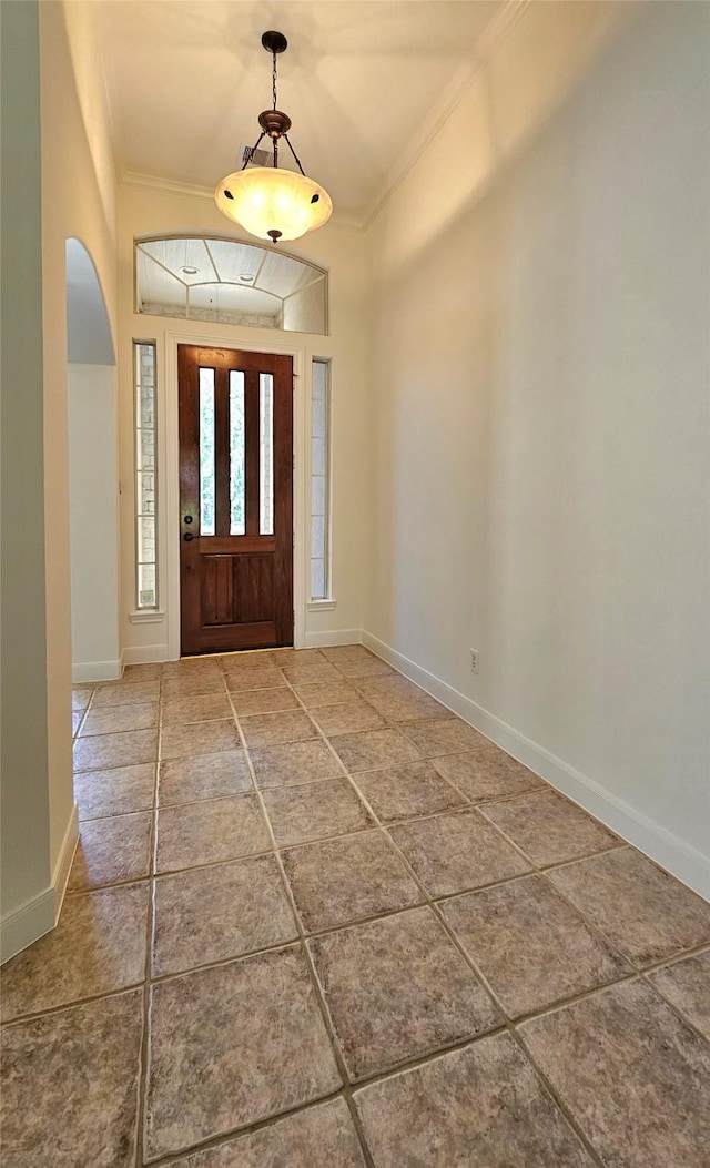108 W Pines Dr, Montgomery, TX 77356 - foyer entrance with crown molding and baseboards