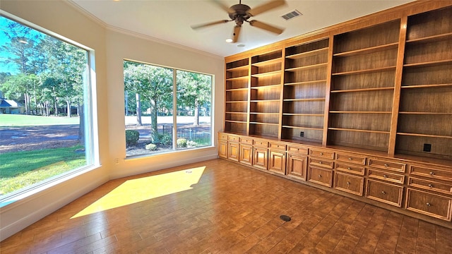 108 W Pines Dr, Montgomery, TX 77356 - spare room featuring ornamental molding, ceiling fan, built in features, and dark wood-style floors