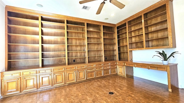 108 W Pines Dr, Montgomery, TX 77356 - unfurnished office featuring built in study area, a ceiling fan, built in features, and wood finished floors