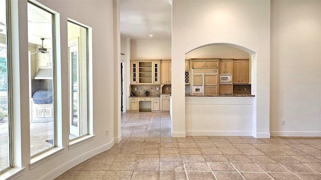 108 W Pines Dr, Montgomery, TX 77356 - corridor with arched walkways and baseboards
