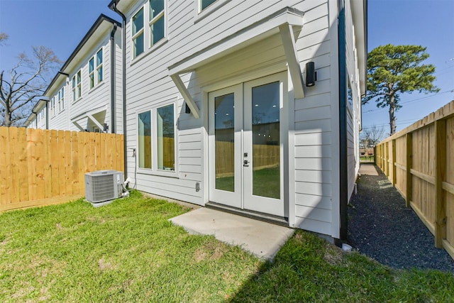 5017 Hardway St, Houston, TX 77092 - doorway to property with french doors and central AC
