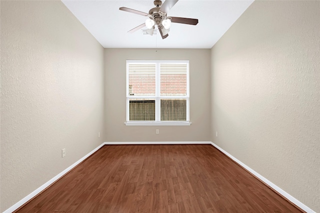 7431 Pony Crk, Missouri City, TX 77459 - unfurnished room featuring baseboards, wood finished floors, ceiling fan, and a textured wall
