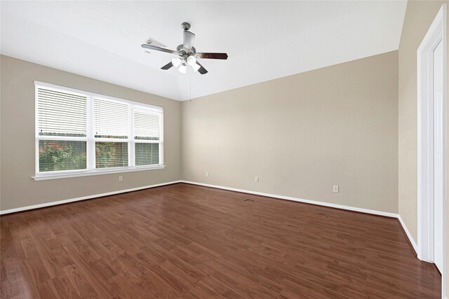 7431 Pony Crk, Missouri City, TX 77459 - spare room with dark wood-type flooring, baseboards, and ceiling fan