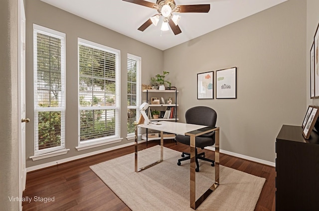 7431 Pony Crk, Missouri City, TX 77459 - office area featuring a ceiling fan, baseboards, and dark wood-style flooring