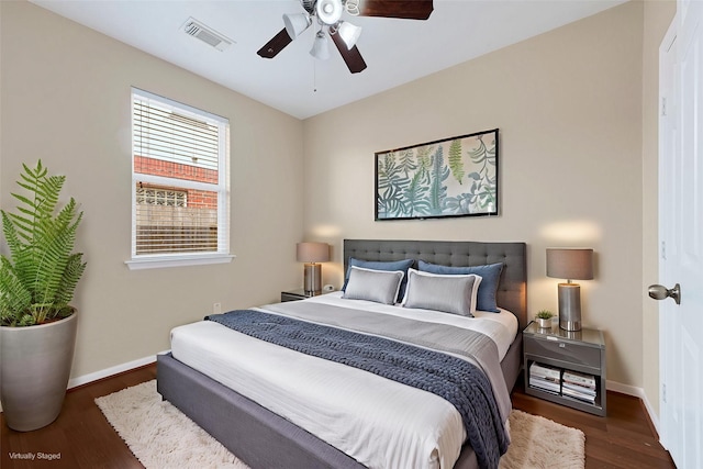 7431 Pony Crk, Missouri City, TX 77459 - bedroom with wood finished floors, baseboards, and ceiling fan