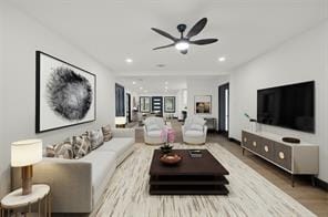 living area featuring a ceiling fan, wood finished floors, and recessed lighting