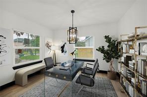 interior space featuring wood finished floors and a notable chandelier
