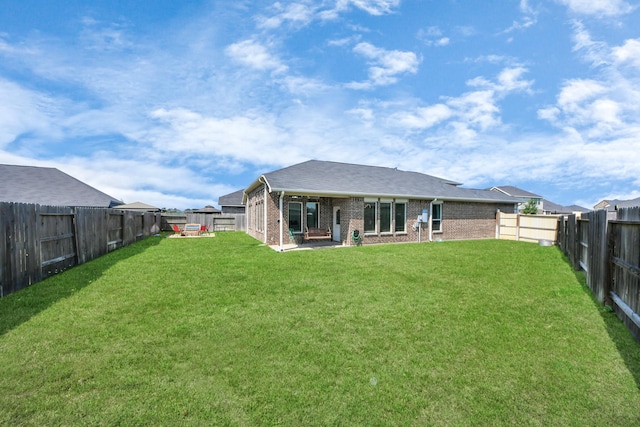 back of house with brick siding