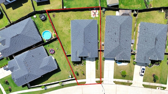 aerial perspective of suburban area with property parcel outlined