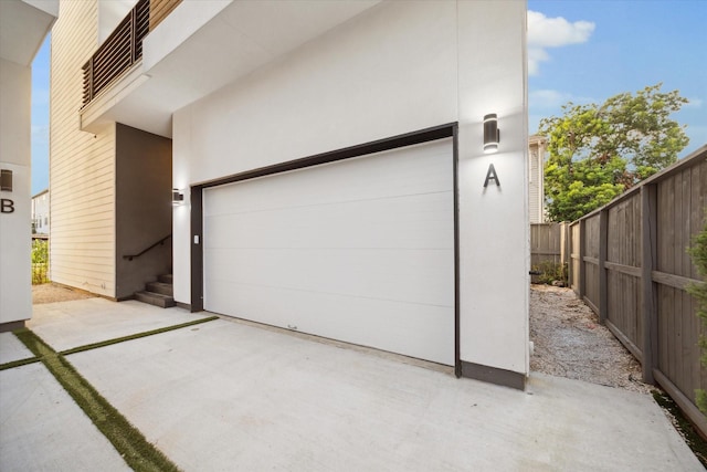 garage featuring fence