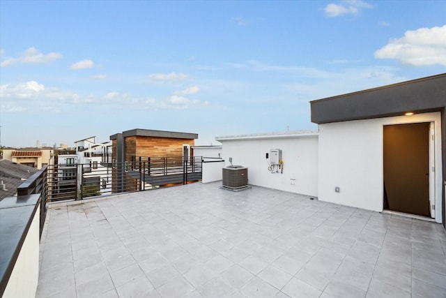 view of patio featuring a balcony and cooling unit