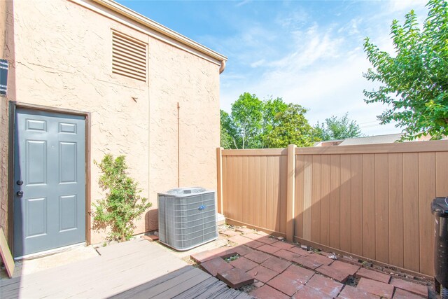 2429 Briarwest Blvd, Houston, TX 77077 - wooden deck featuring cooling unit and fence