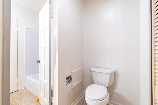 2429 Briarwest Blvd, Houston, TX 77077 - bathroom featuring toilet, tile patterned flooring, and baseboards