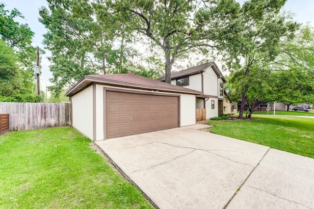 exterior space featuring driveway and fence