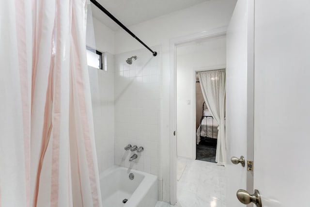bathroom featuring shower / bathtub combination with curtain