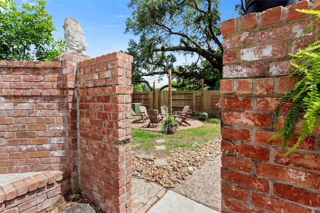 view of yard featuring fence and a patio area