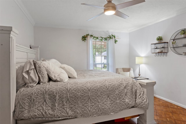 bedroom featuring ornamental molding, baseboards, and ceiling fan