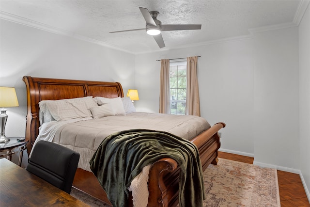 bedroom featuring crown molding, a ceiling fan, baseboards, and a textured ceiling
