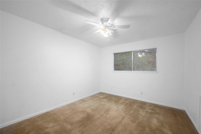 2422 Deasa Dr, Spring, TX 77373 - carpeted empty room with a textured ceiling, baseboards, and ceiling fan