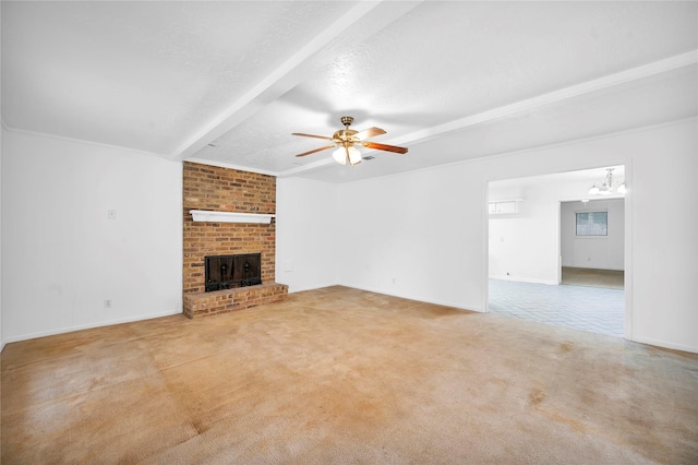 2422 Deasa Dr, Spring, TX 77373 - unfurnished living room with ceiling fan with notable chandelier, a fireplace, baseboards, beamed ceiling, and light colored carpet