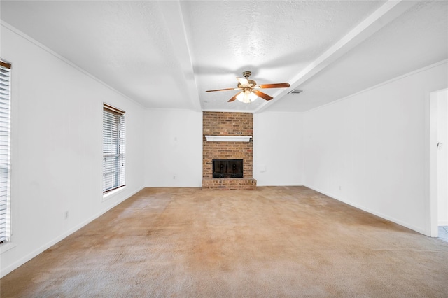 2422 Deasa Dr, Spring, TX 77373 - unfurnished living room with a textured ceiling, baseboards, ceiling fan, light carpet, and a fireplace