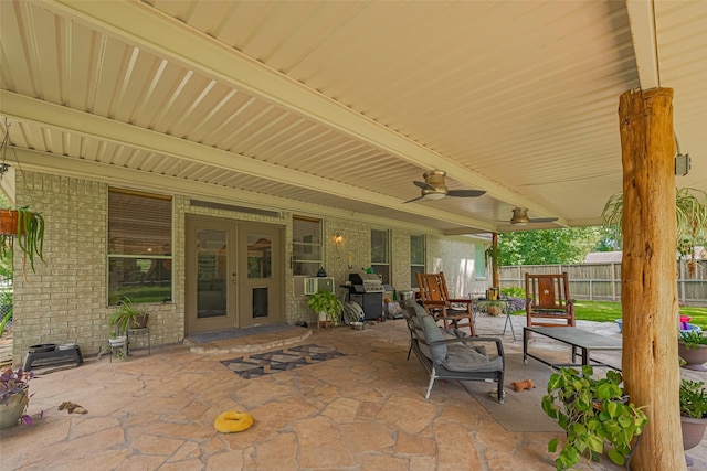 view of patio / terrace with french doors, fence, ceiling fan, and grilling area